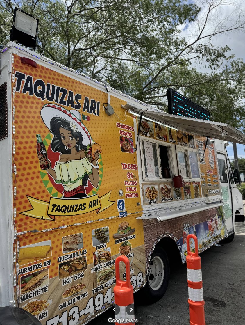 The Taquizas Ari food truck parked with its menu boards and service window
