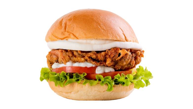 A crispy chicken burger with lettuce and tomato