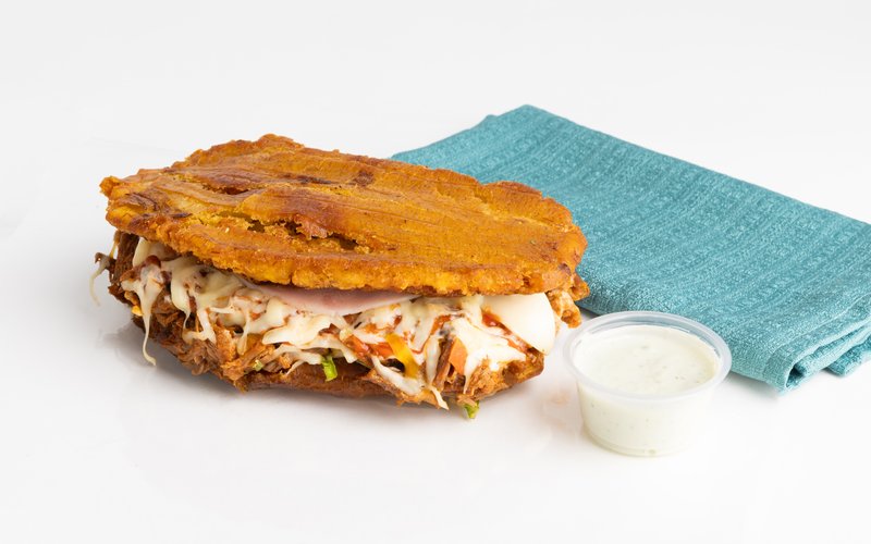 A sandwich made with crisp plantain and a savory filling