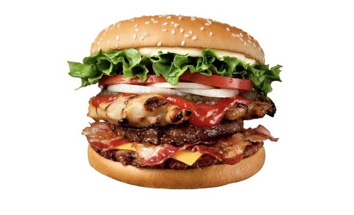 A double burger stacked with cheese, tomato, and lettuce